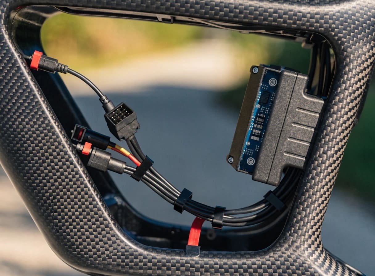 E-Bike System Integration and Wiring A close-up of e-bike wiring and connectors, showing system integration