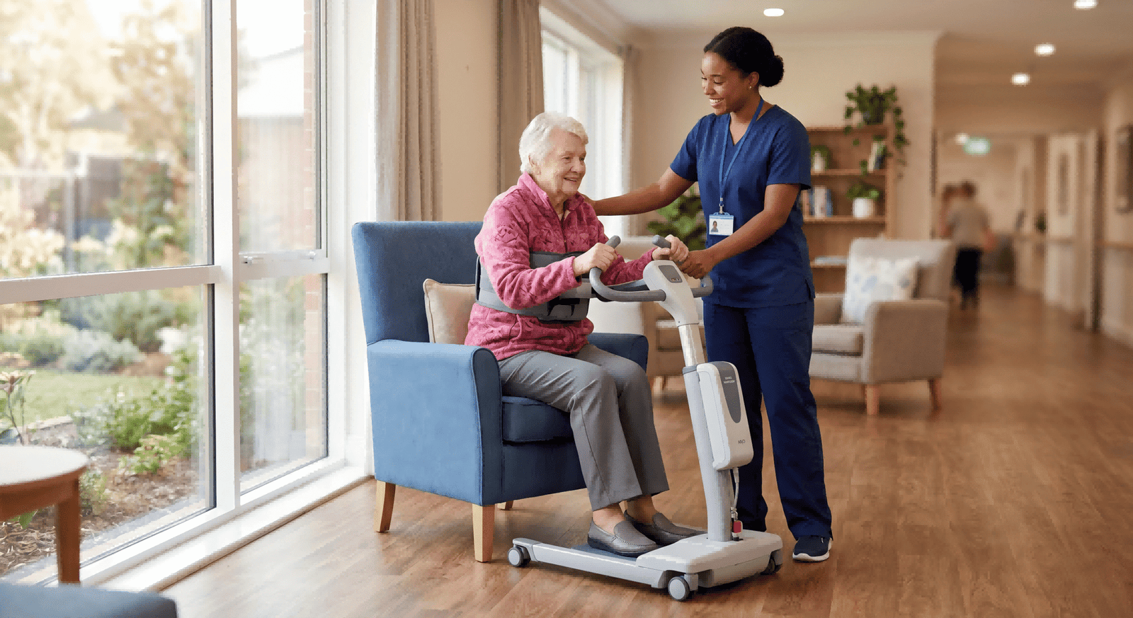 Smart Aids Reducing Caregiver Strain A caregiver assisting a resident with a modern electric wheelchair in a well-lit nursing facility.